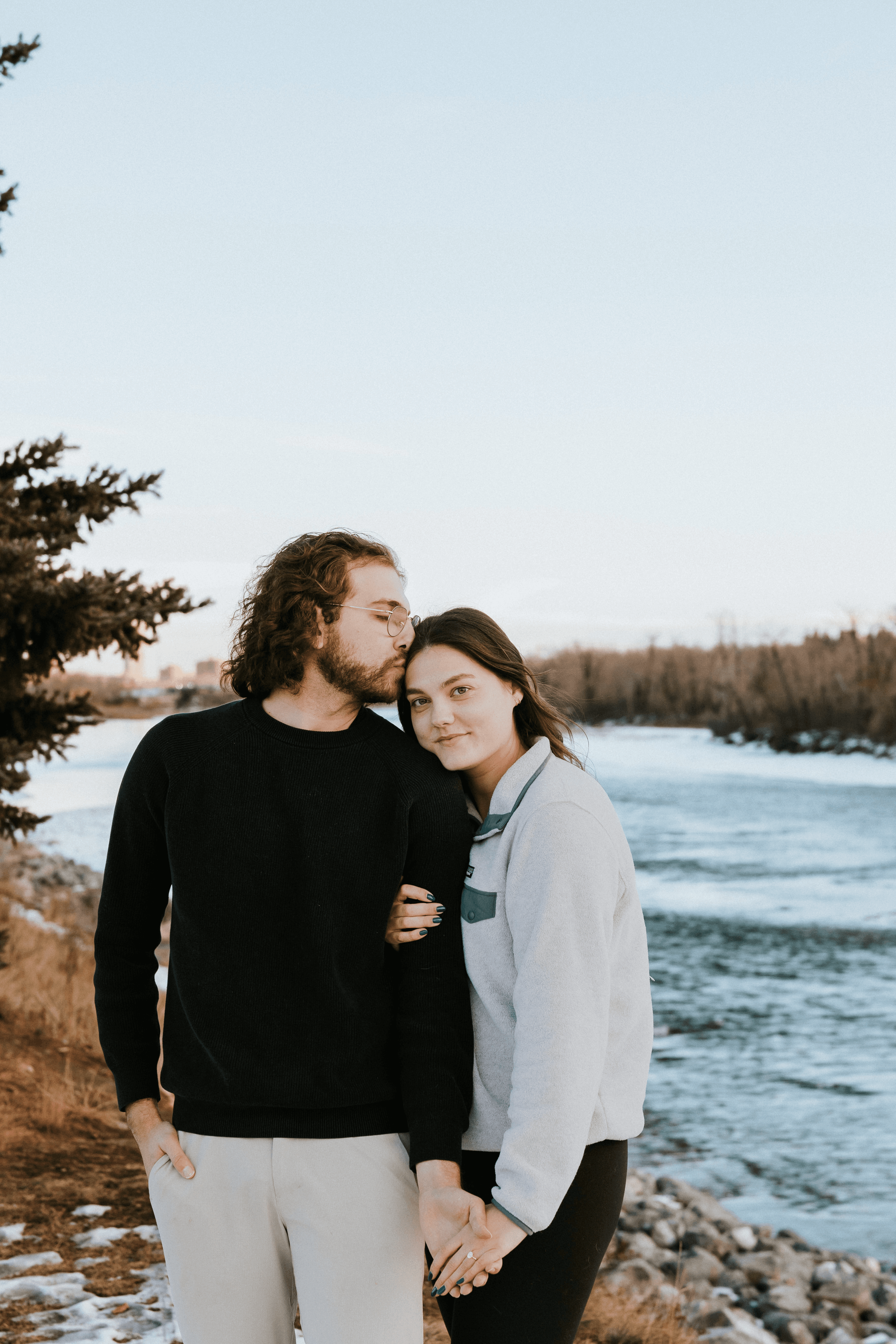 Couple by the river